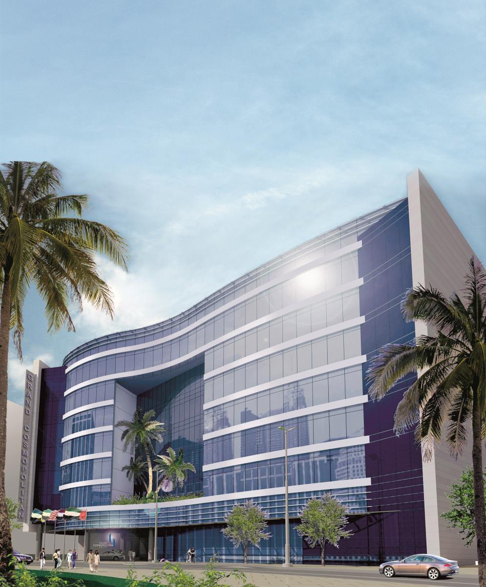 迪拜大都会大酒店 外观 照片 The photo showcases a modern, architectural building characterized by its sleek, curved design and large glass panels. The building features a foreground with palm trees, suggesting a tropical or warm climate. The sky above is clear, adding to the br